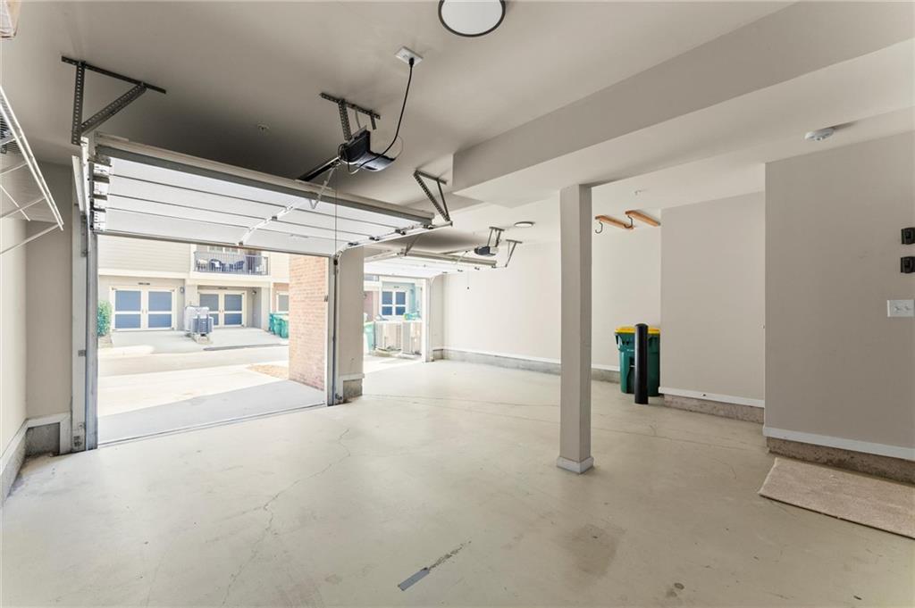 6468 Chariot Street, Unit 19 Atlanta, GA 30328 - Photo 31 of 43 a view of an empty room with a window