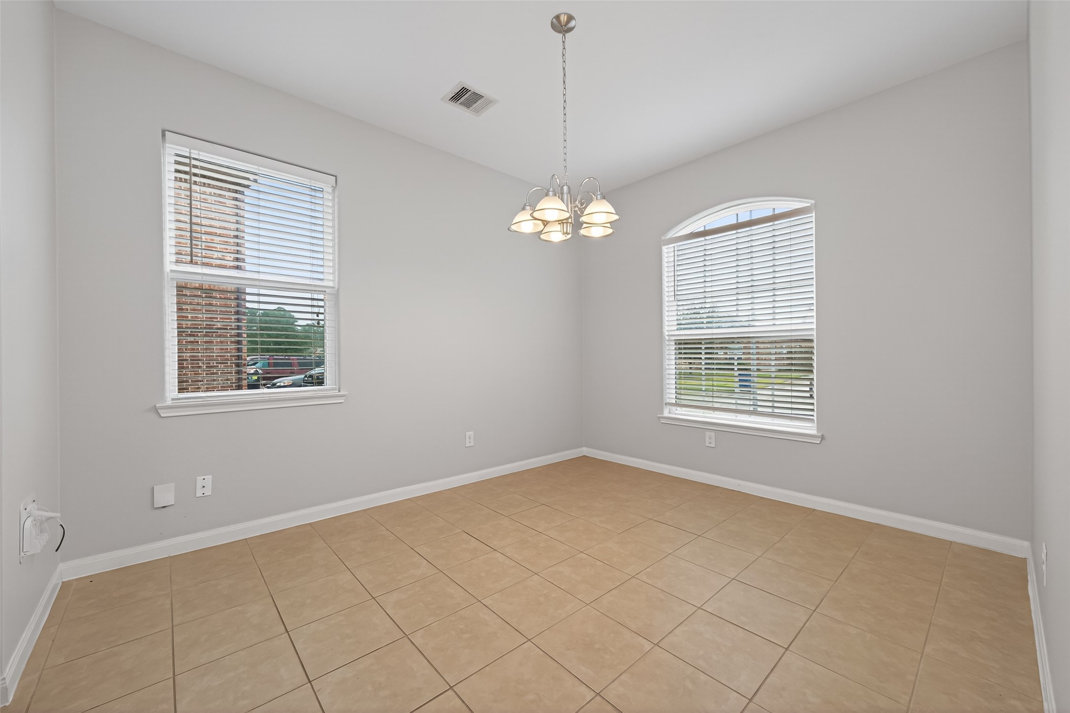 12038 Powderhorn Lane Pinehurst, TX 77362 - Photo 18 of 50 a view of an empty room with a window