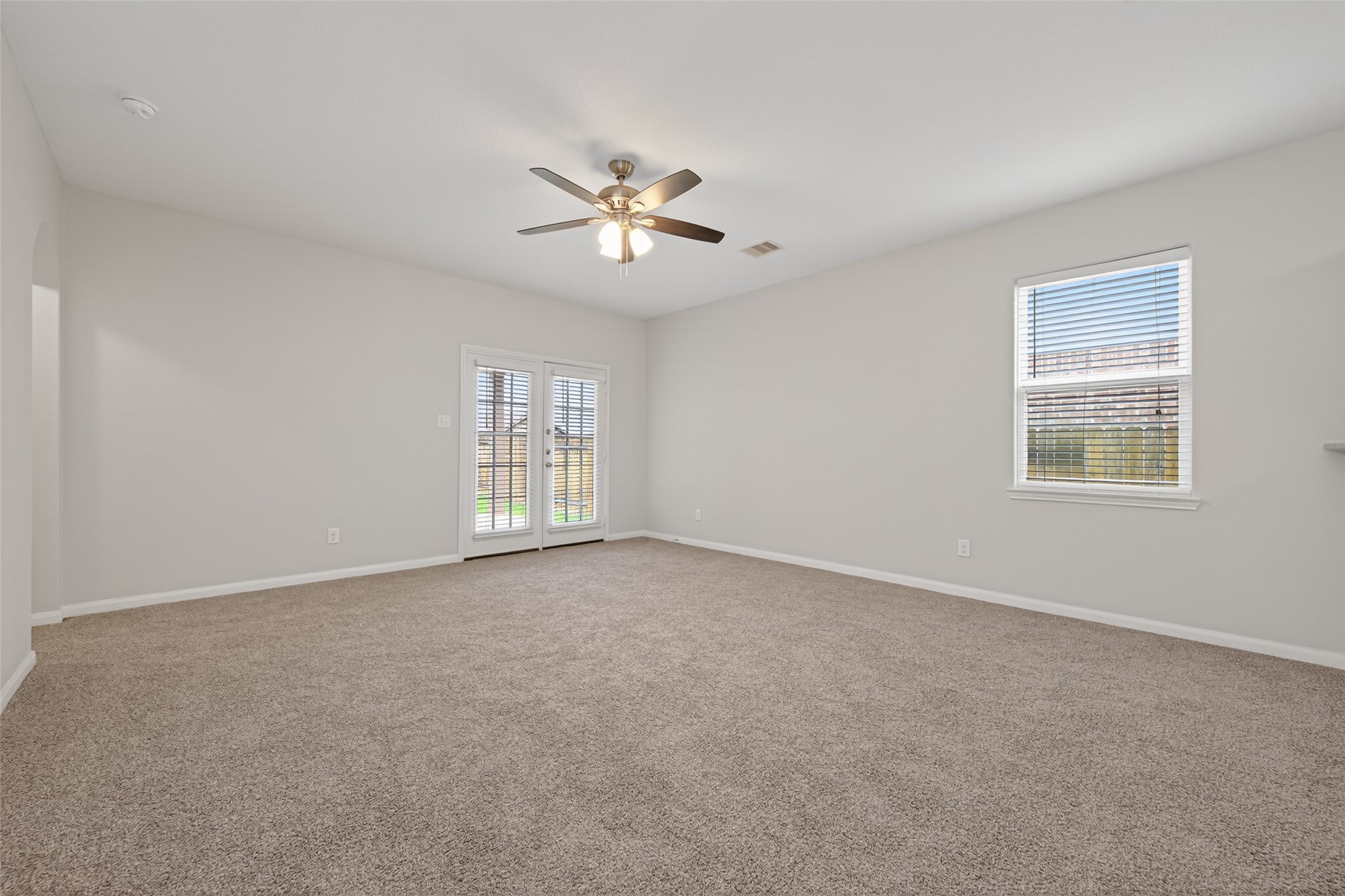12038 Powderhorn Lane Pinehurst, TX 77362 - Photo 19 of 50 a view of an empty room with a window
