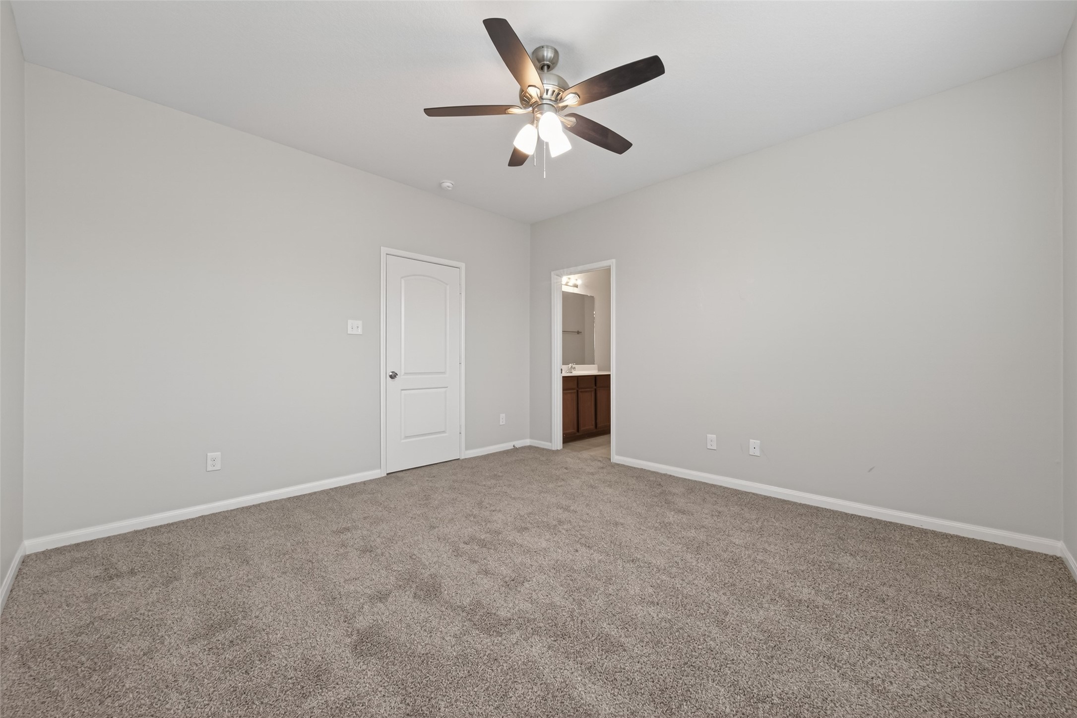 12038 Powderhorn Lane Pinehurst, TX 77362 - Photo 25 of 50 an empty room with closet and ceiling fan