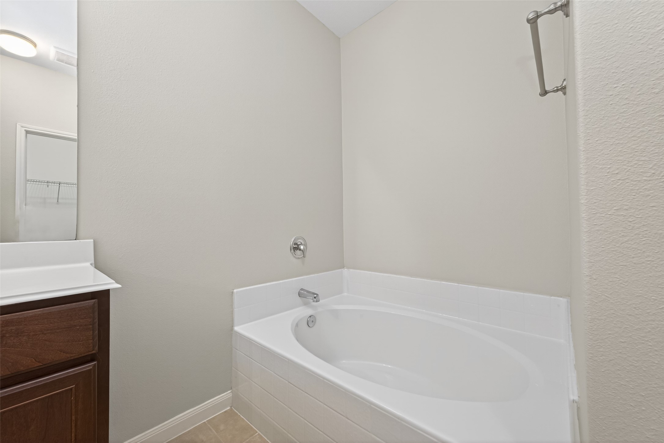 12038 Powderhorn Lane Pinehurst, TX 77362 - Photo 31 of 50 a white bath tub sitting next to a white sink