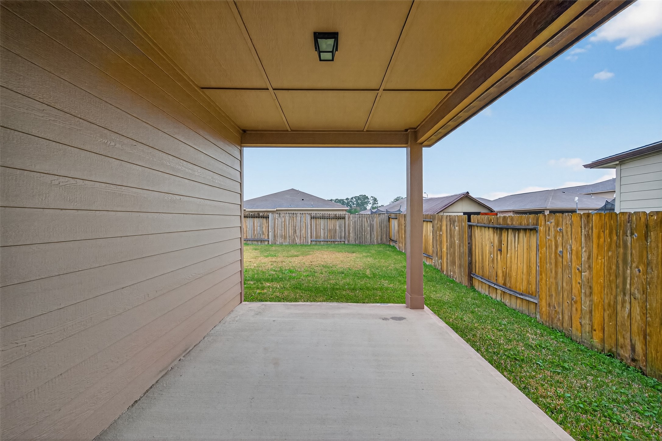 12038 Powderhorn Lane Pinehurst, TX 77362 - Photo 38 of 50 a view of a backyard