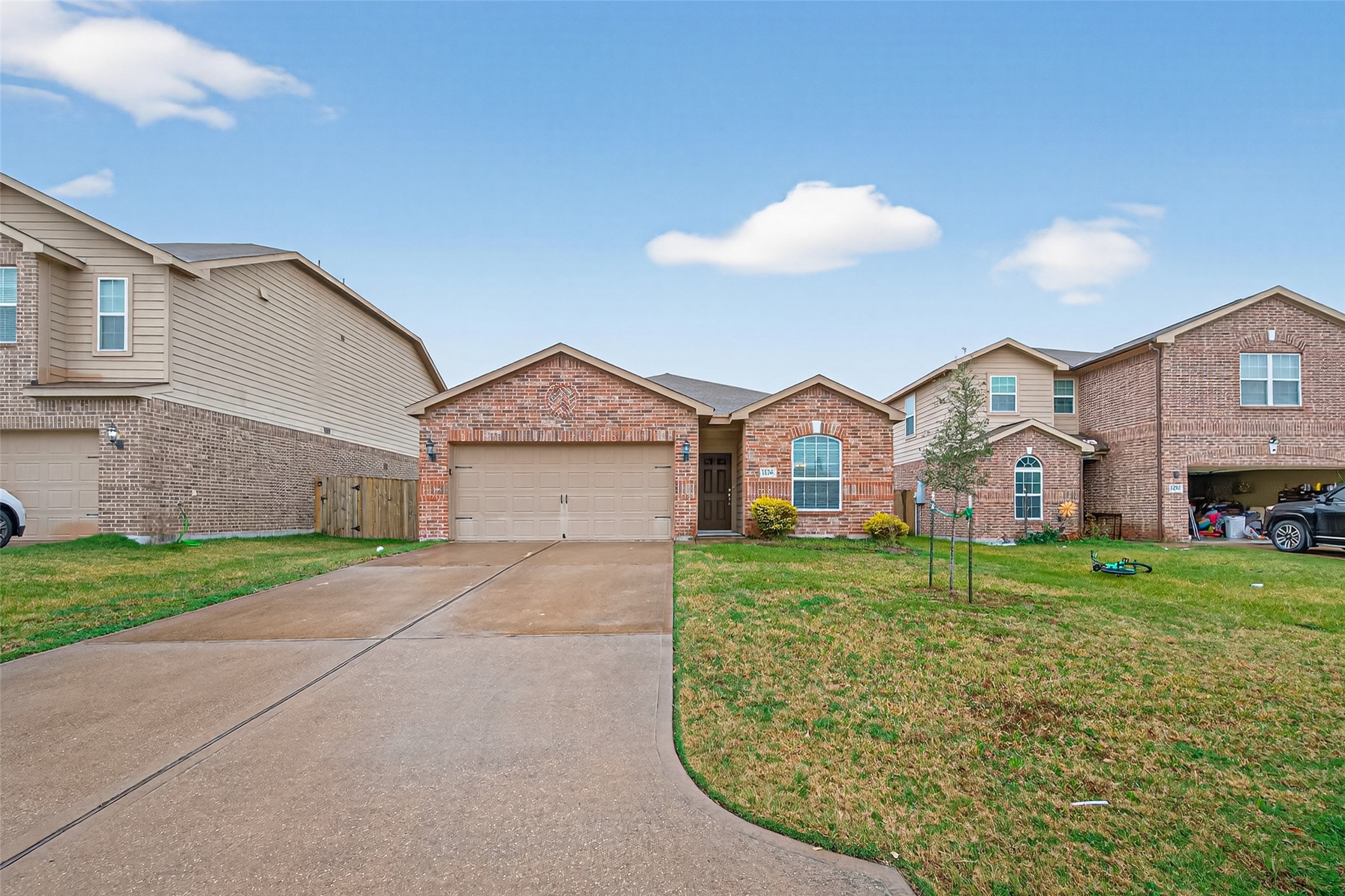 12038 Powderhorn Lane Pinehurst, TX 77362 - Photo 47 of 50 a view of a big house with a big yard and large trees