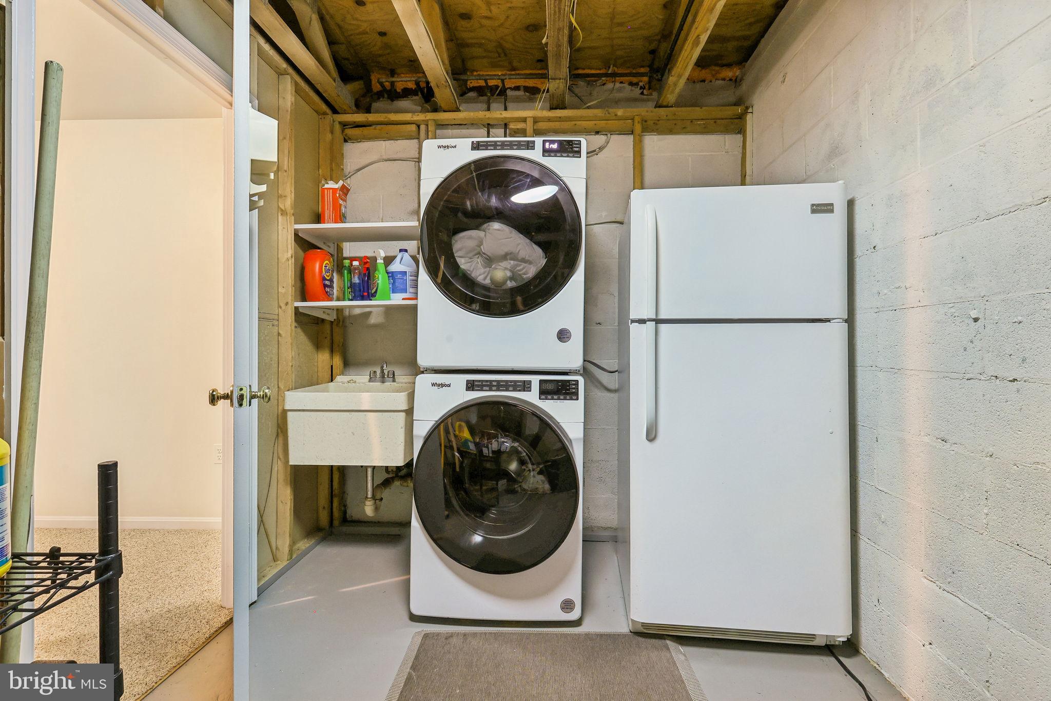 11714 Dry River Court Reston, VA 20191 - Photo 18 of 24 a utility room with dryer and washer