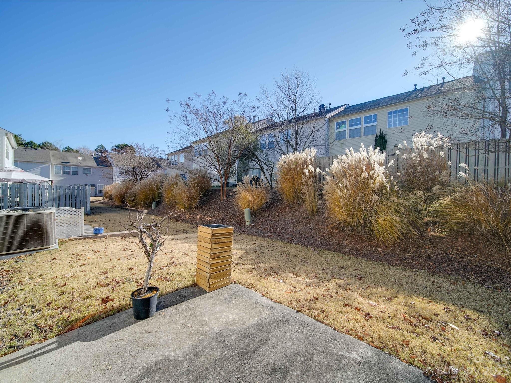 11755 Huxley Road Charlotte, NC 28277 - Photo 34 of 37 a view of a yard with an outdoor space