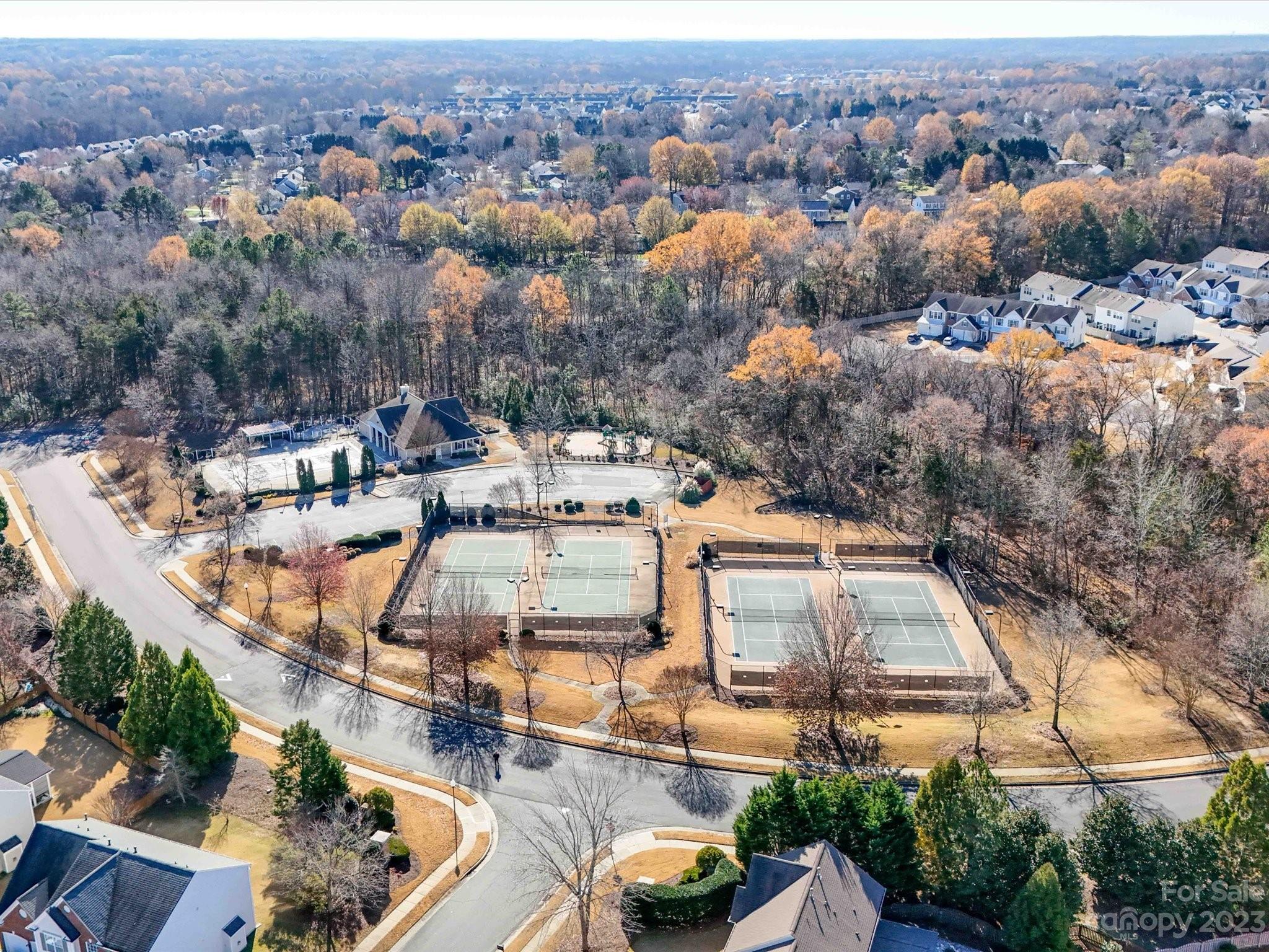 11755 Huxley Road Charlotte, NC 28277 - Photo 36 of 37 an aerial view of a house with a swimming pool