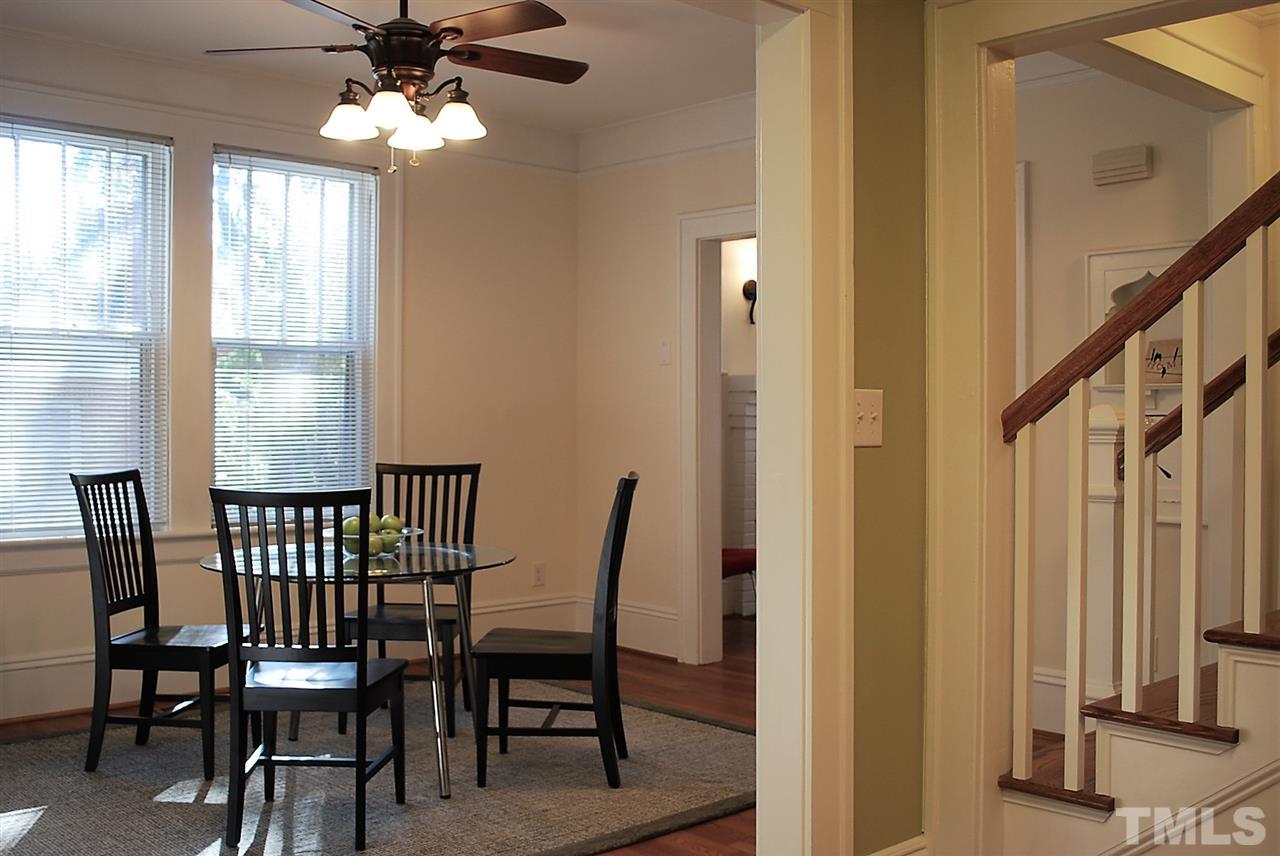 2274 The Circle Raleigh, NC 27608 - Photo 11 of 25 a view of a dining room with furniture window and outside view