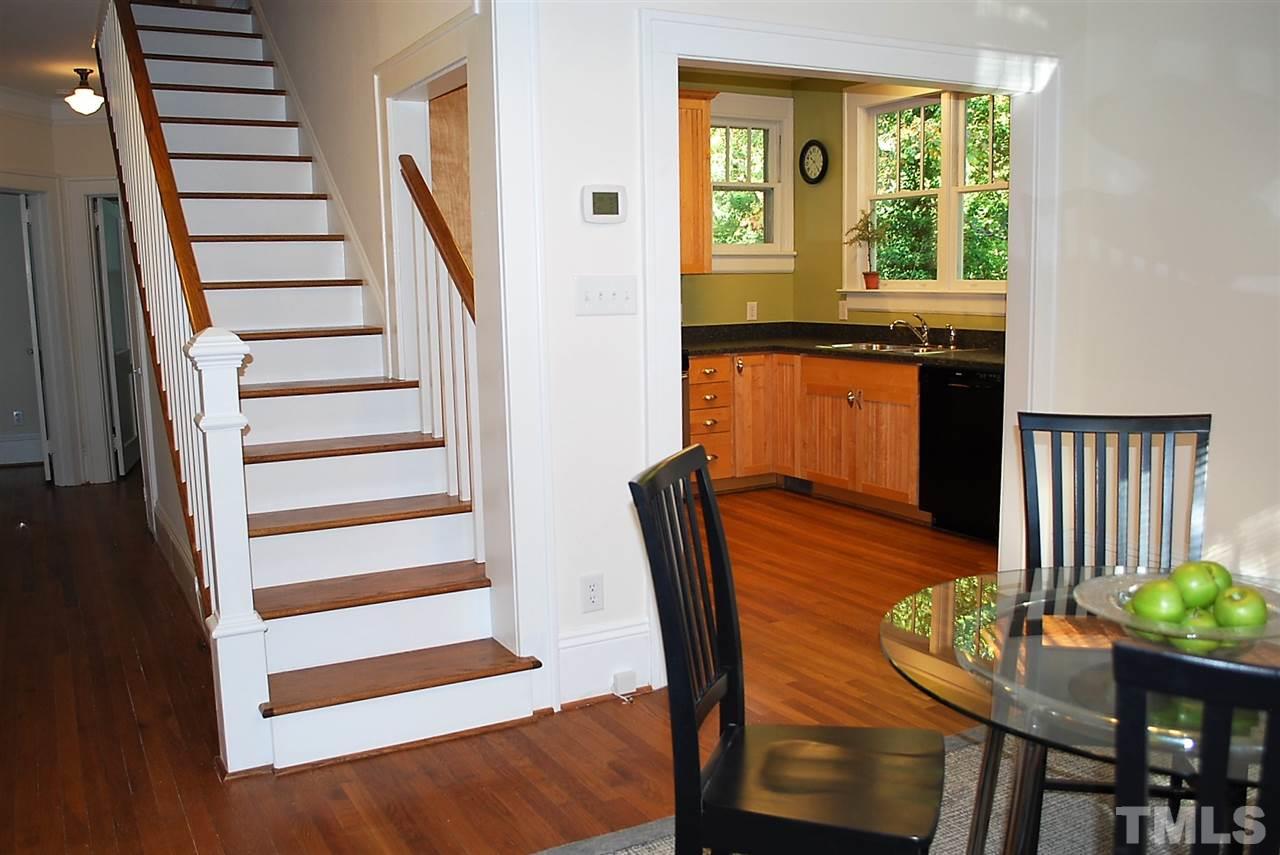 2274 The Circle Raleigh, NC 27608 - Photo 10 of 25 a view of a dining room with furniture and a window