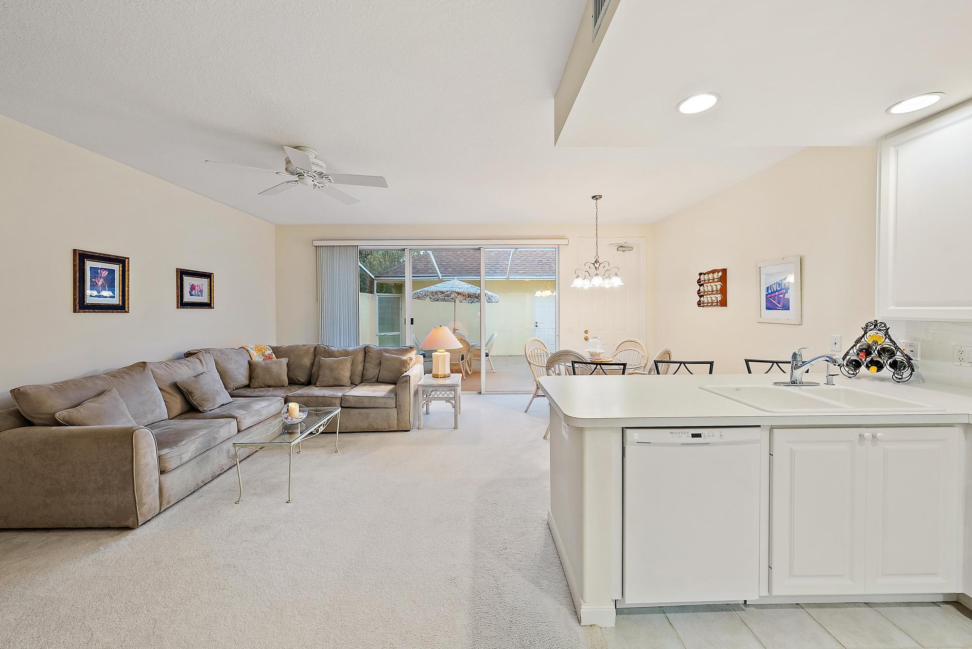 277 New Haven Boulevard Jupiter, FL 33458 - Photo 17 of 36 Kitchen/Living View