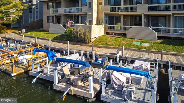 a view of a chairs and table in a patio
