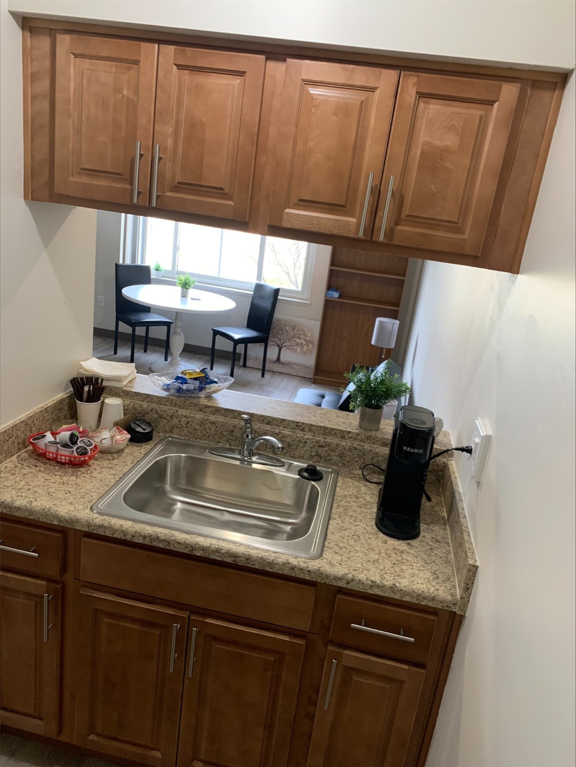 8400 Engleman Street Center Line, MI 48015 - Photo 11 of 16 a kitchen with a sink and cabinets