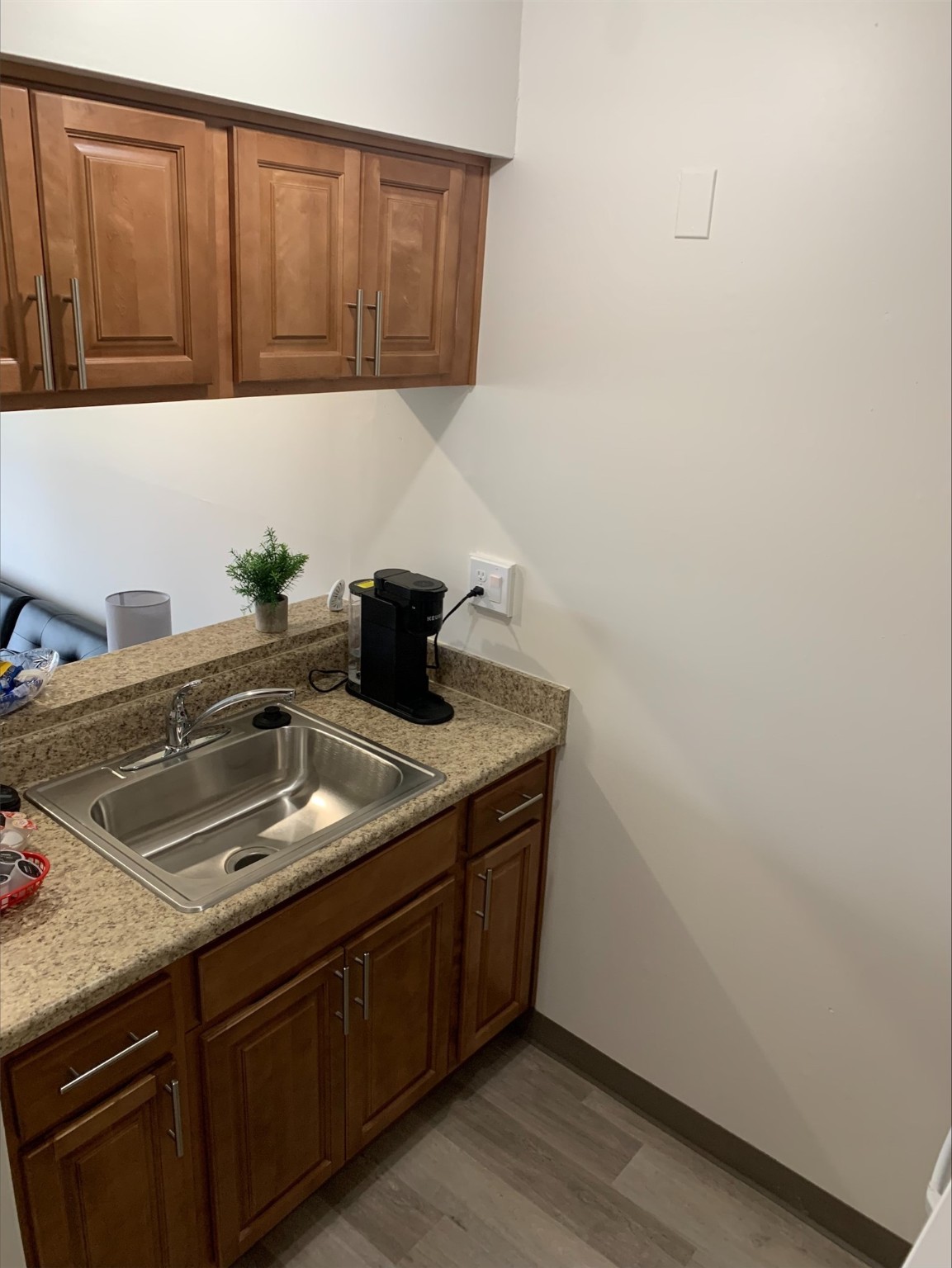 8400 Engleman Street Center Line, MI 48015 - Photo 14 of 16 a kitchen with a sink and cabinets