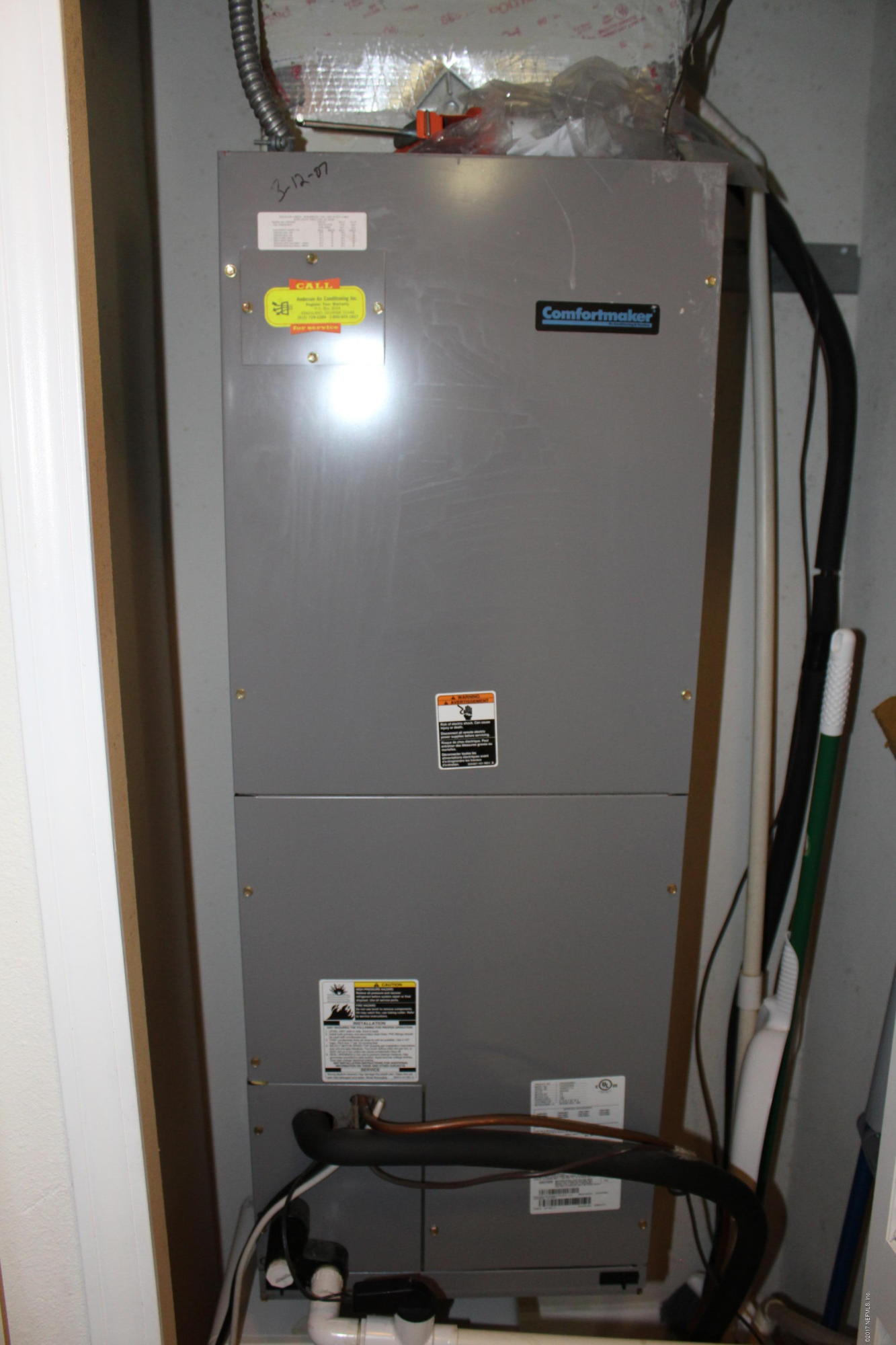 3680 Kirkpatrick Circle, Unit 5 Jacksonville, FL 32210 - Photo 14 of 18 a view of storage and utility room with racks on the wall