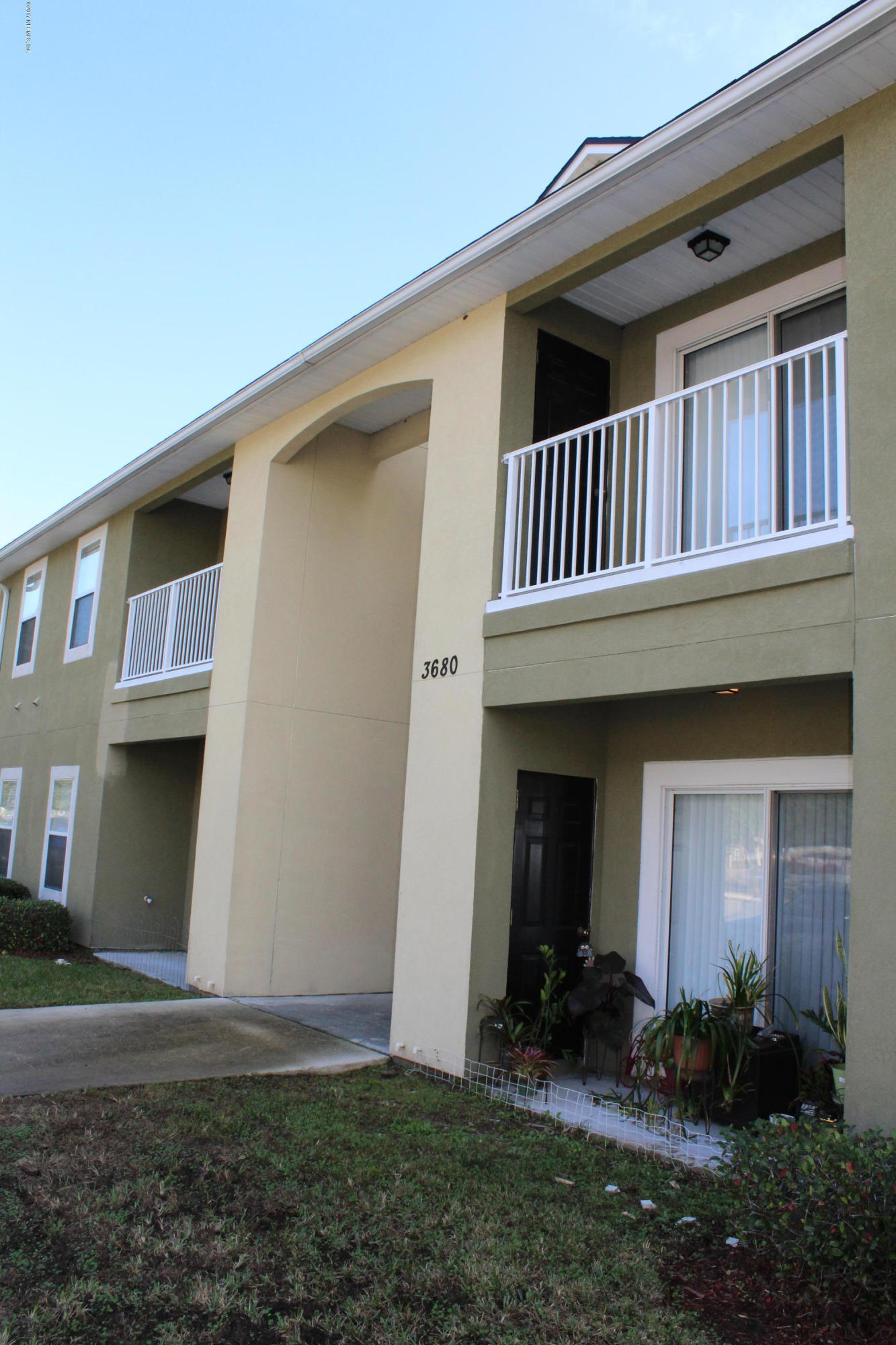 3680 Kirkpatrick Circle, Unit 5 Jacksonville, FL 32210 - Photo 2 of 18 a view of front door of house
