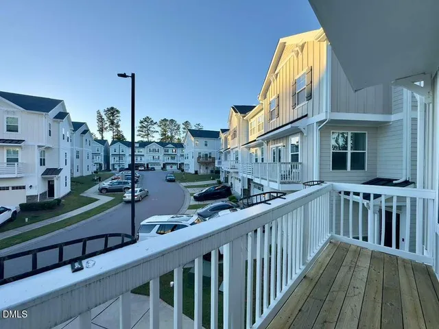 a view of a street with a building