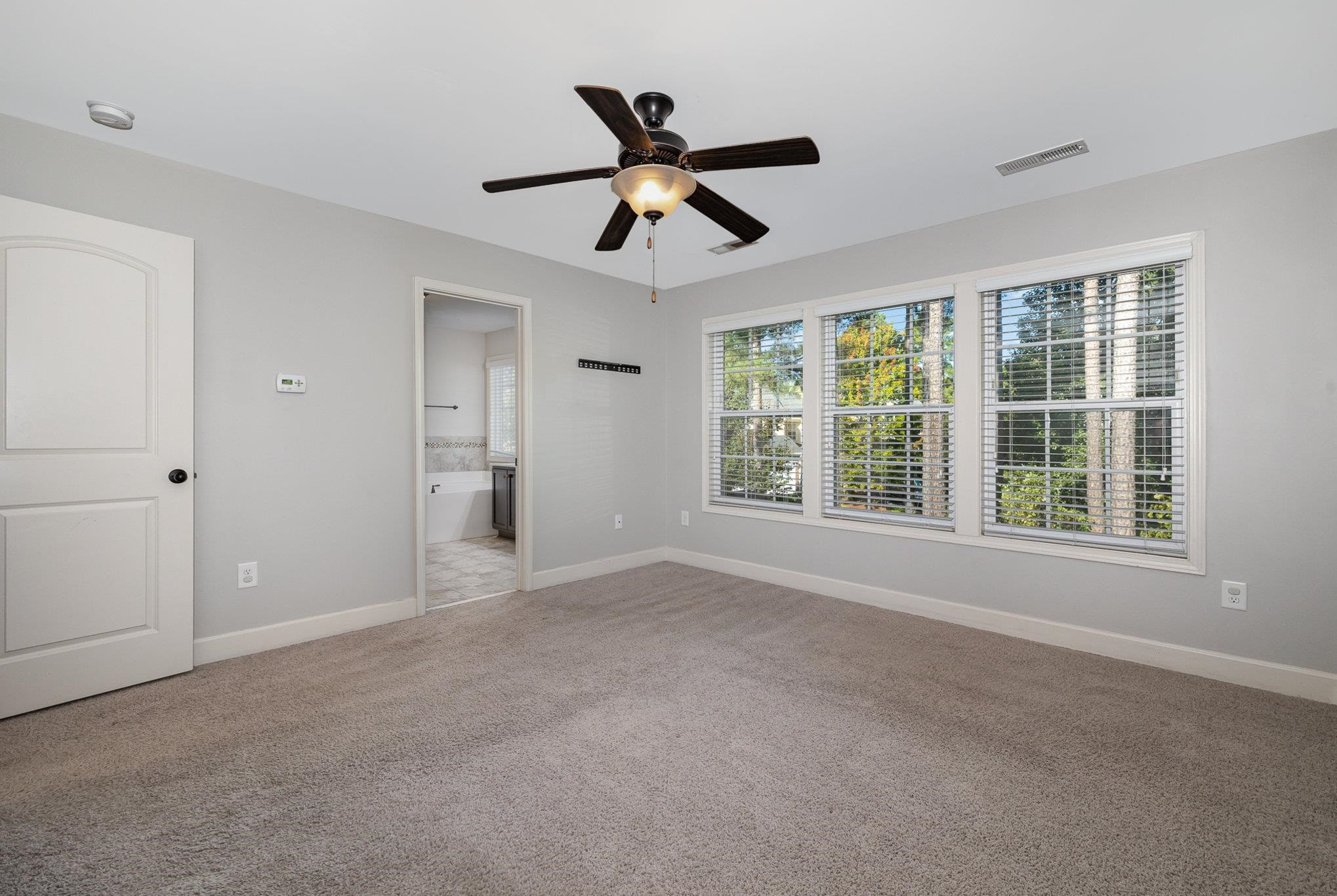135 Pine Hawk Drive Spring Lake, NC 28390 - Photo 13 of 41 a view of an empty room with a window