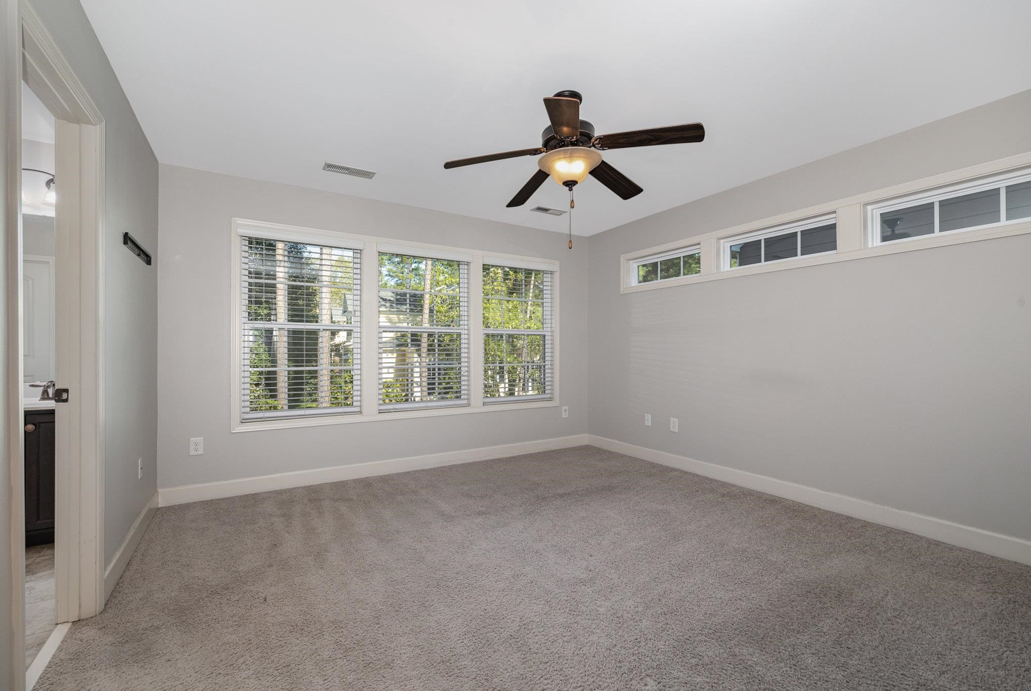 135 Pine Hawk Drive Spring Lake, NC 28390 - Photo 14 of 41 a view of room with window and ceiling fan