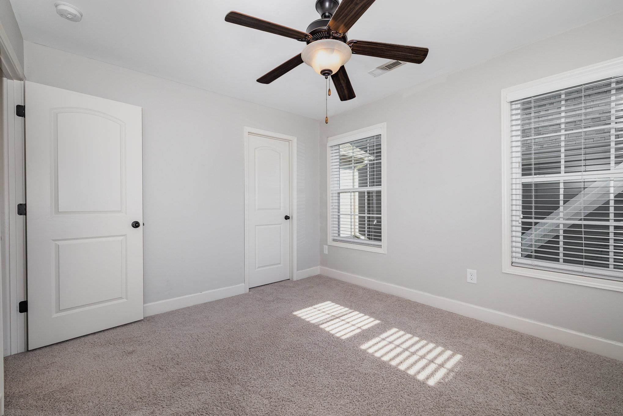 135 Pine Hawk Drive Spring Lake, NC 28390 - Photo 20 of 41 a view of an empty room with a window