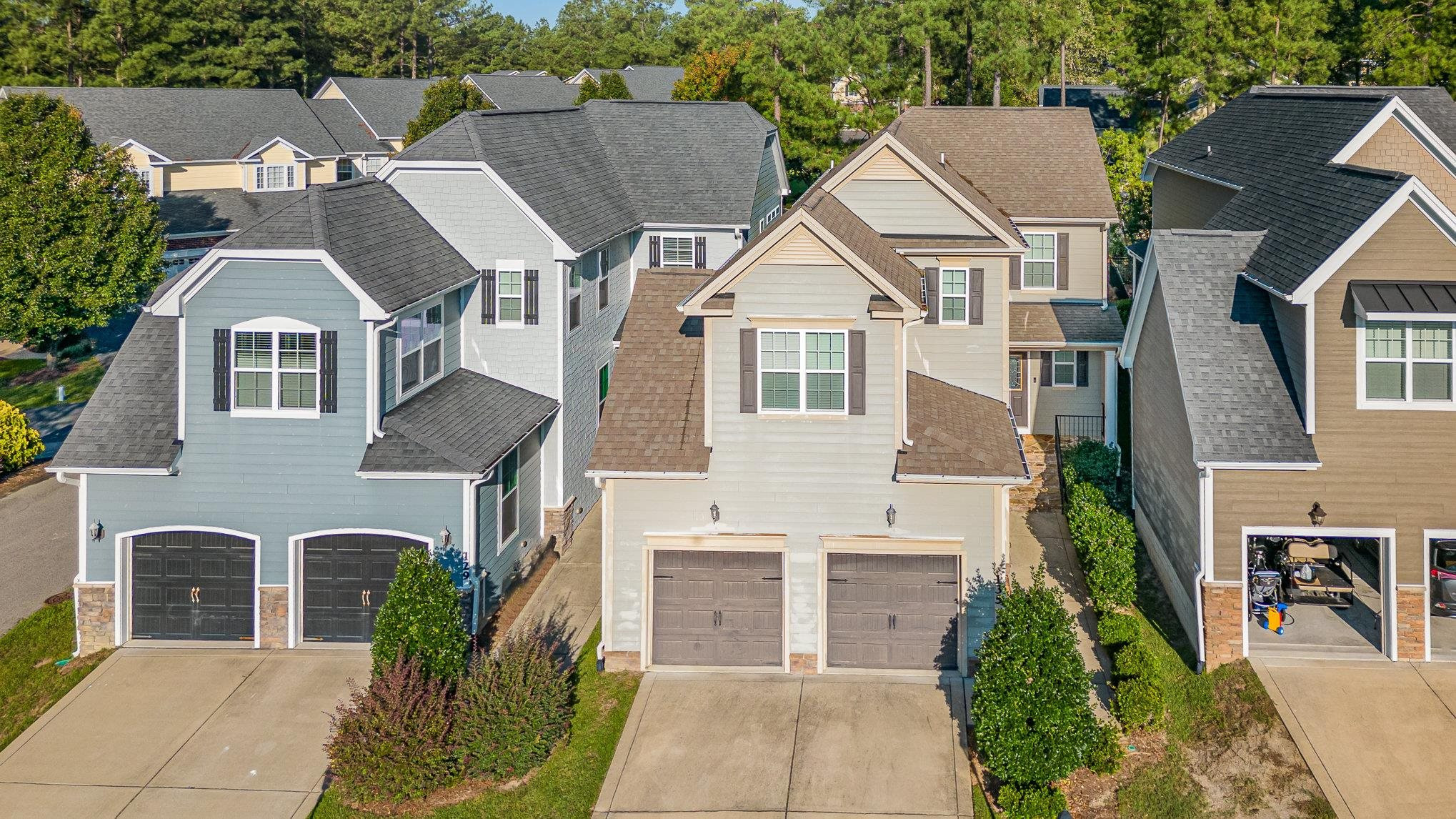 135 Pine Hawk Drive Spring Lake, NC 28390 - Photo 2 of 41 a front view of a house with glass windows and brick walls