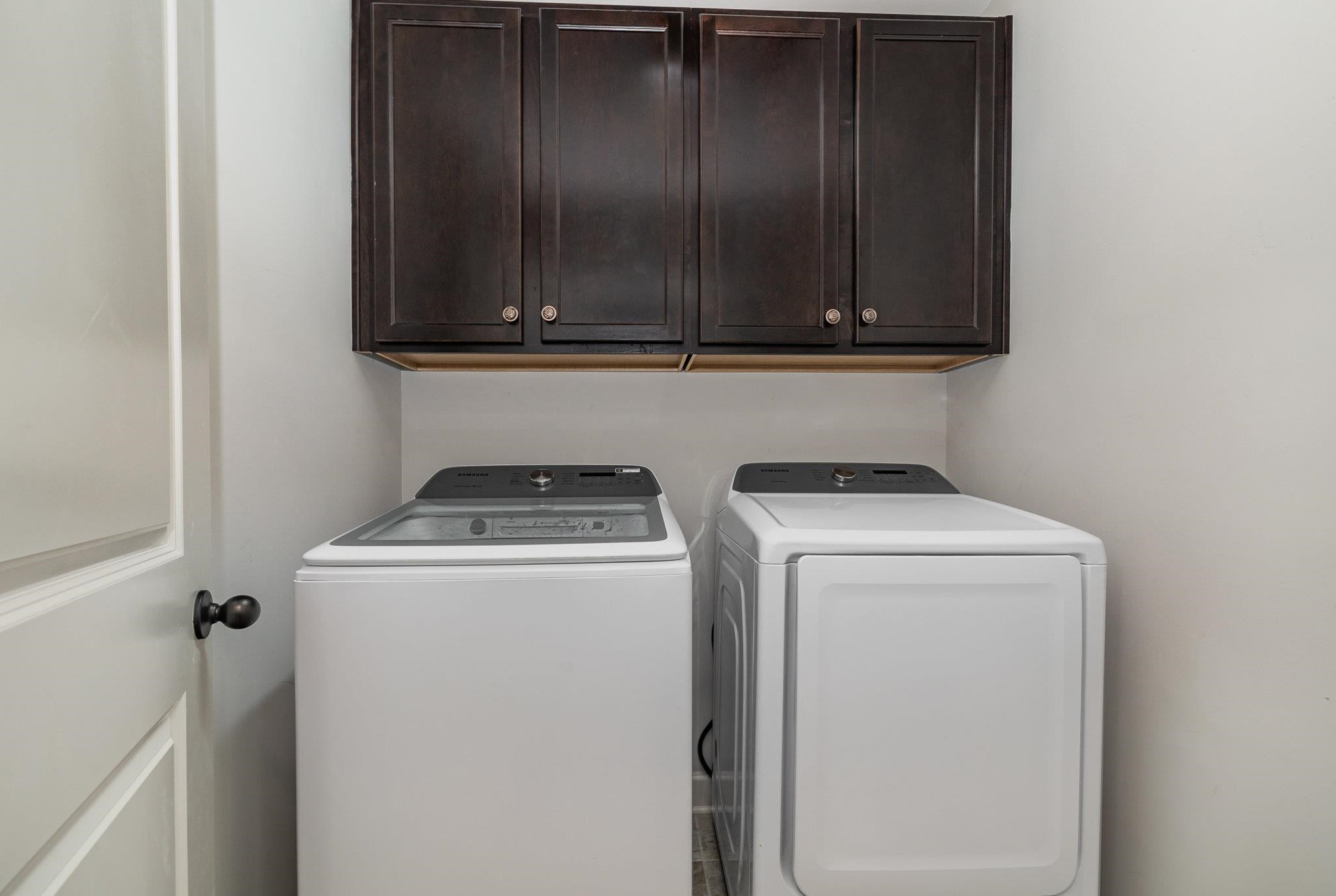 135 Pine Hawk Drive Spring Lake, NC 28390 - Photo 23 of 41 a utility room with dryer and washer