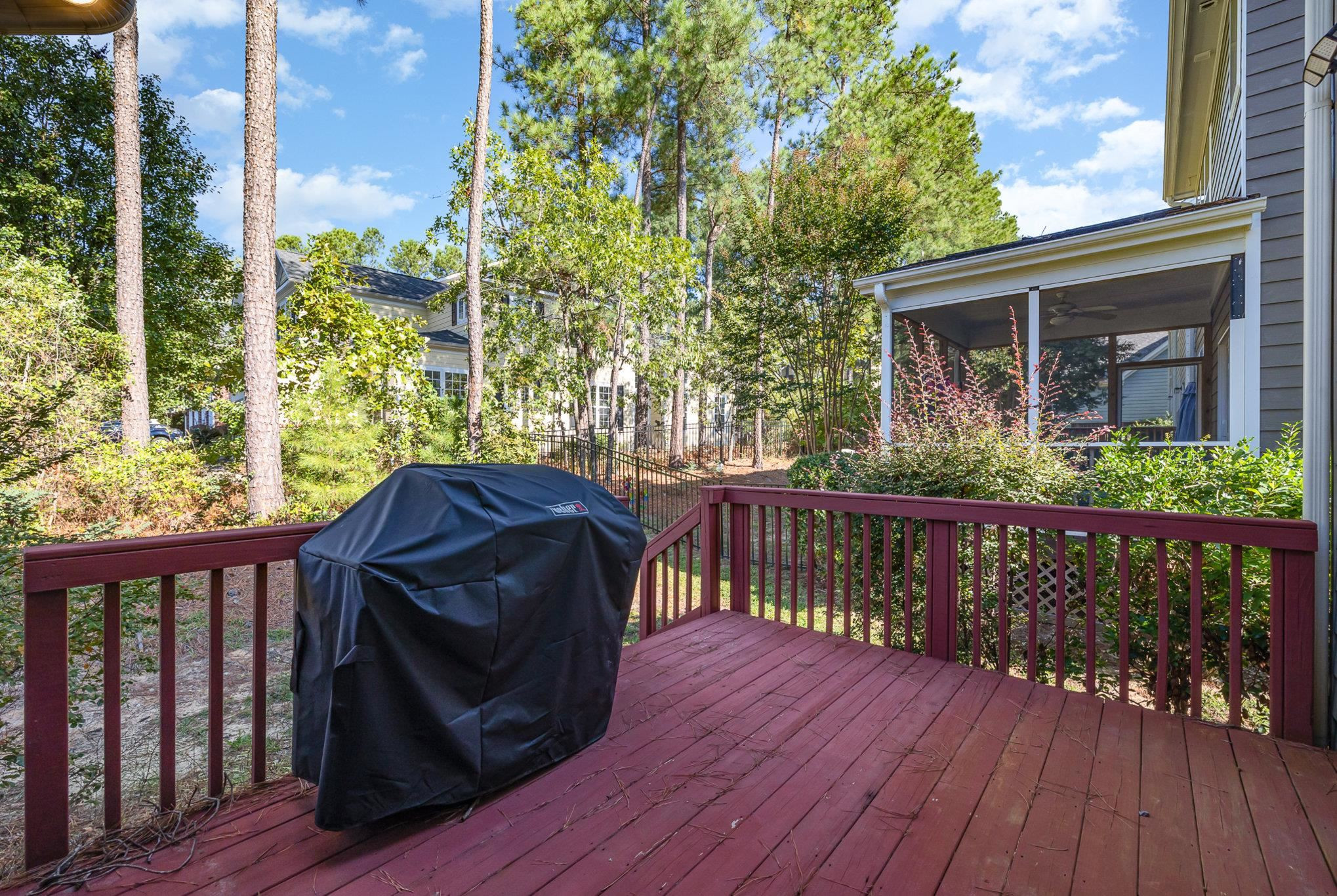 135 Pine Hawk Drive Spring Lake, NC 28390 - Photo 25 of 41 a view of a two chairs in the deck