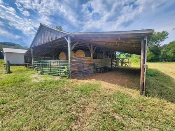 a house with trees in the background