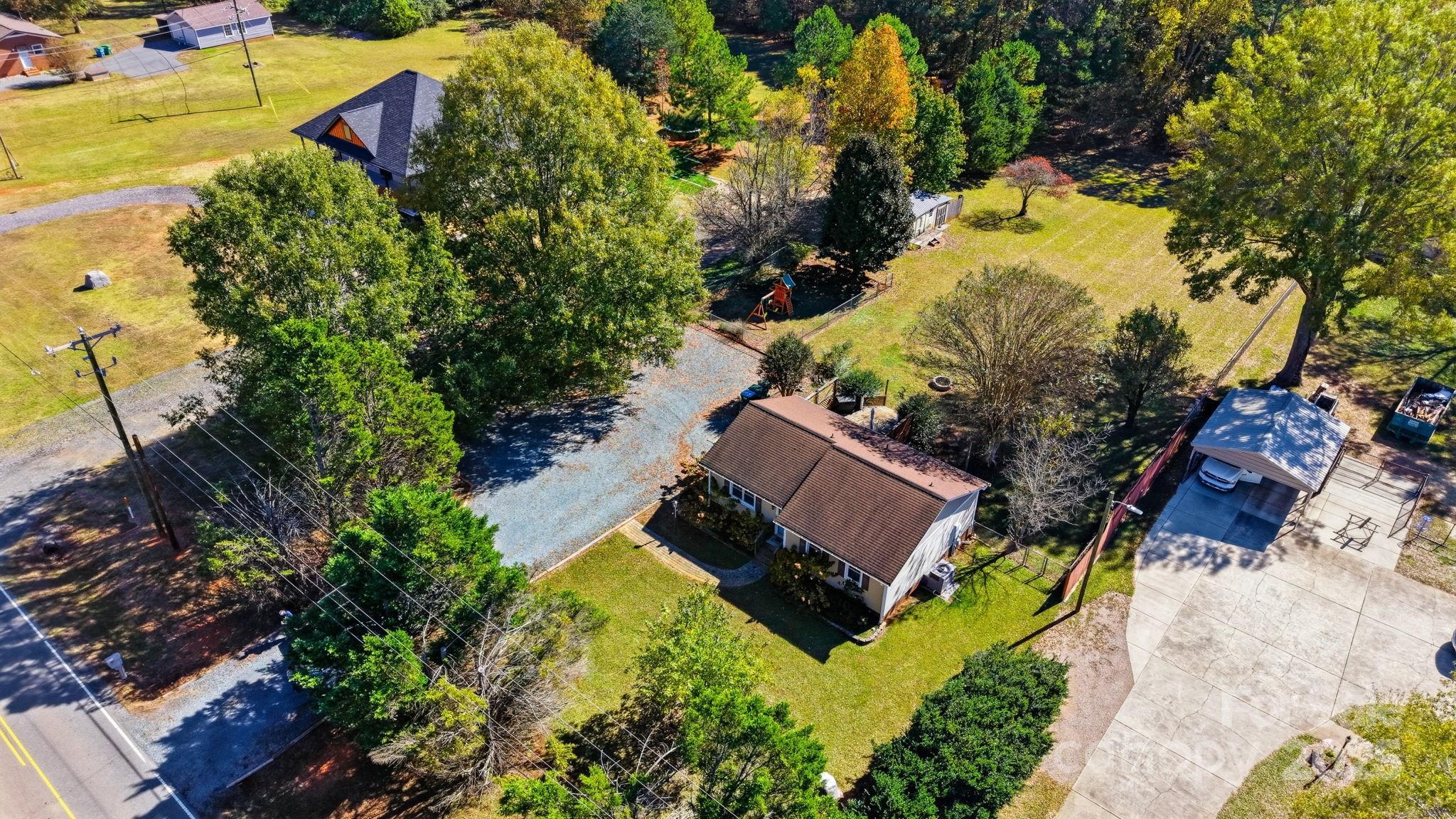 9116 Brief Road Mint Hill, NC 28227 - Photo 21 of 24 an aerial view of a house with a yard