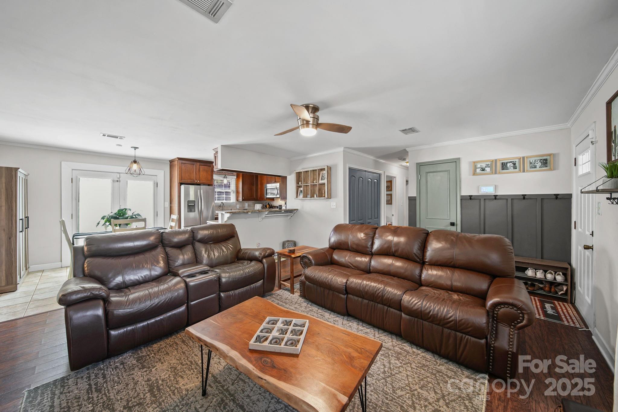 9116 Brief Road Mint Hill, NC 28227 - Photo 4 of 24 a living room with furniture and a rug