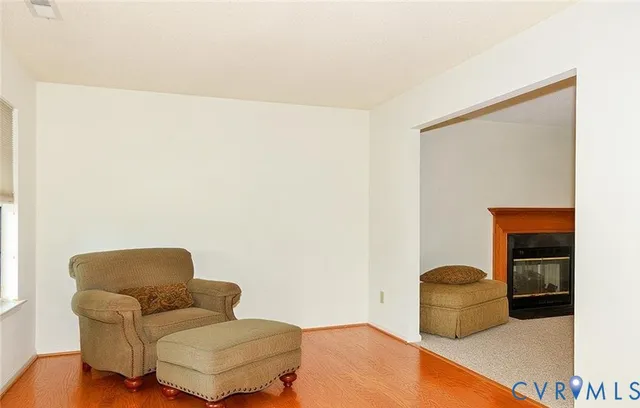 a view of a balcony with furniture