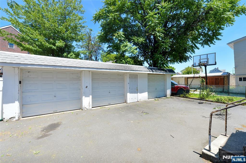 62 Broadway, Unit 1 Hackensack, NJ 07601 - Photo 22 of 25 front view of a house with a garage