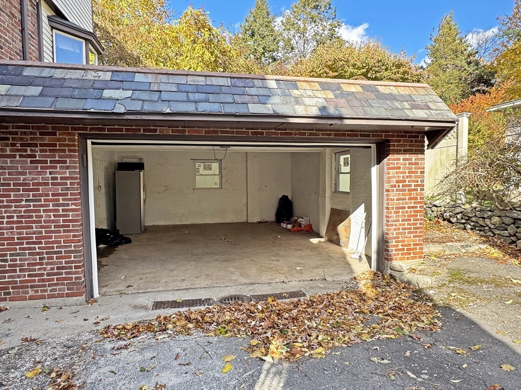280 Quinobequin Road Newton, MA 02468 - Photo 31 of 31 a view of a house with a door