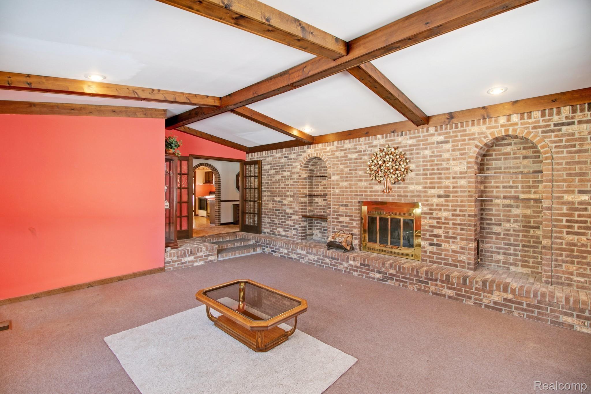 19754 Fry Road Northville, MI 48167 - Photo 12 of 35 Large living room with working natural fireplace.