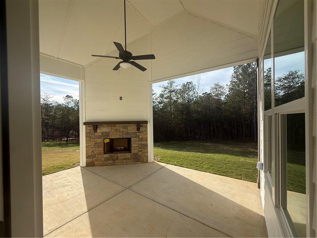 1723 Darby Road Waleska, GA 30183 - Photo 22 of 29 a view of an empty room with a fireplace