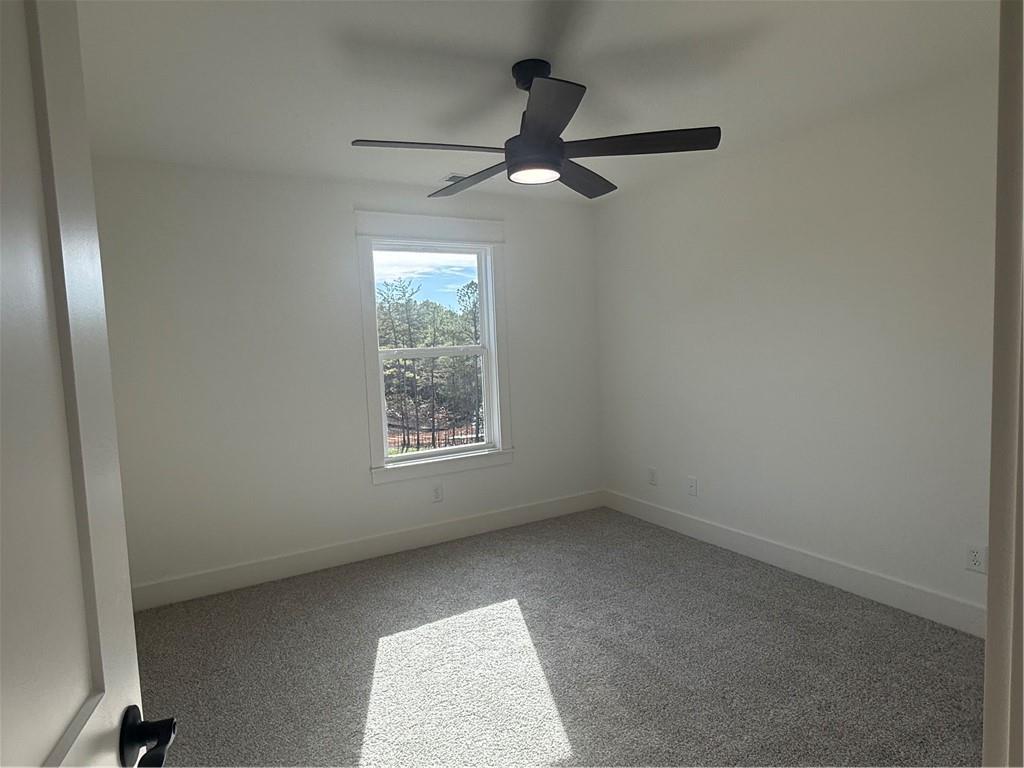 1723 Darby Road Waleska, GA 30183 - Photo 24 of 29 an empty room with a window