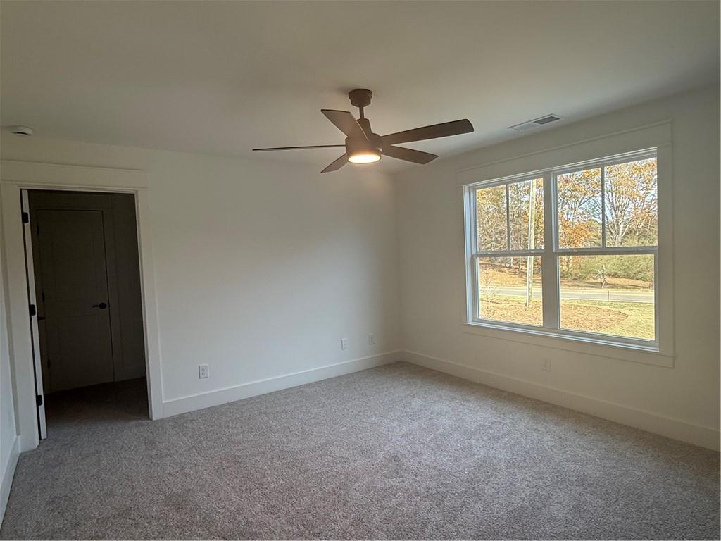 1723 Darby Road Waleska, GA 30183 - Photo 25 of 29 a view of an empty room with a window
