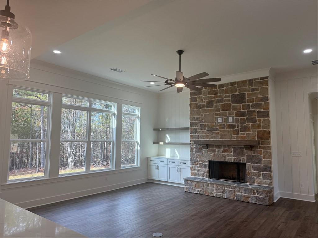 1723 Darby Road Waleska, GA 30183 - Photo 7 of 29 a view of empty room with wooden floor and fireplace