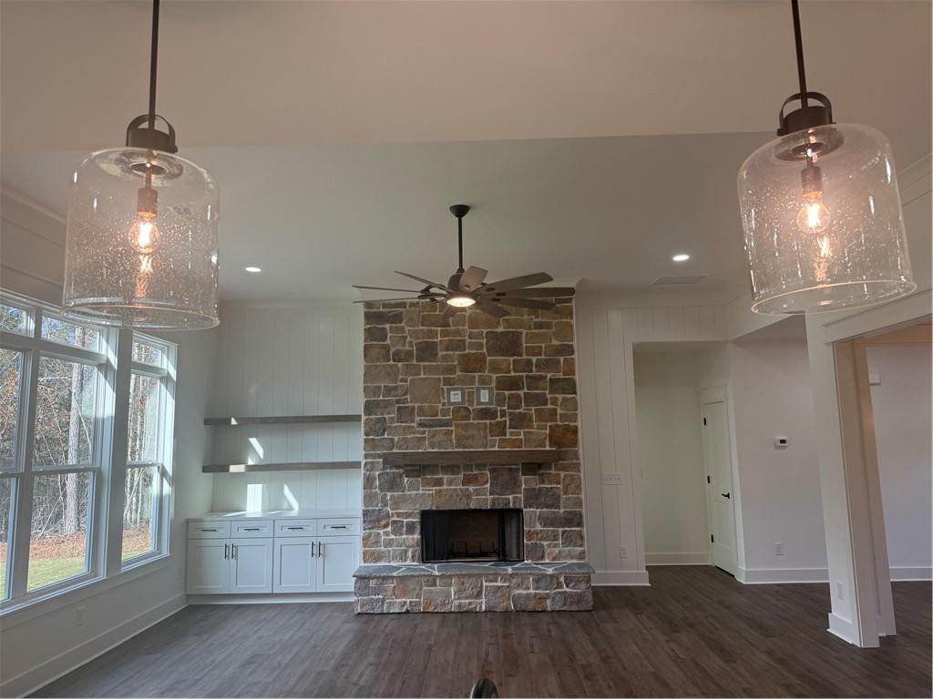 1723 Darby Road Waleska, GA 30183 - Photo 8 of 29 a living room with hard wood floors and a fireplace