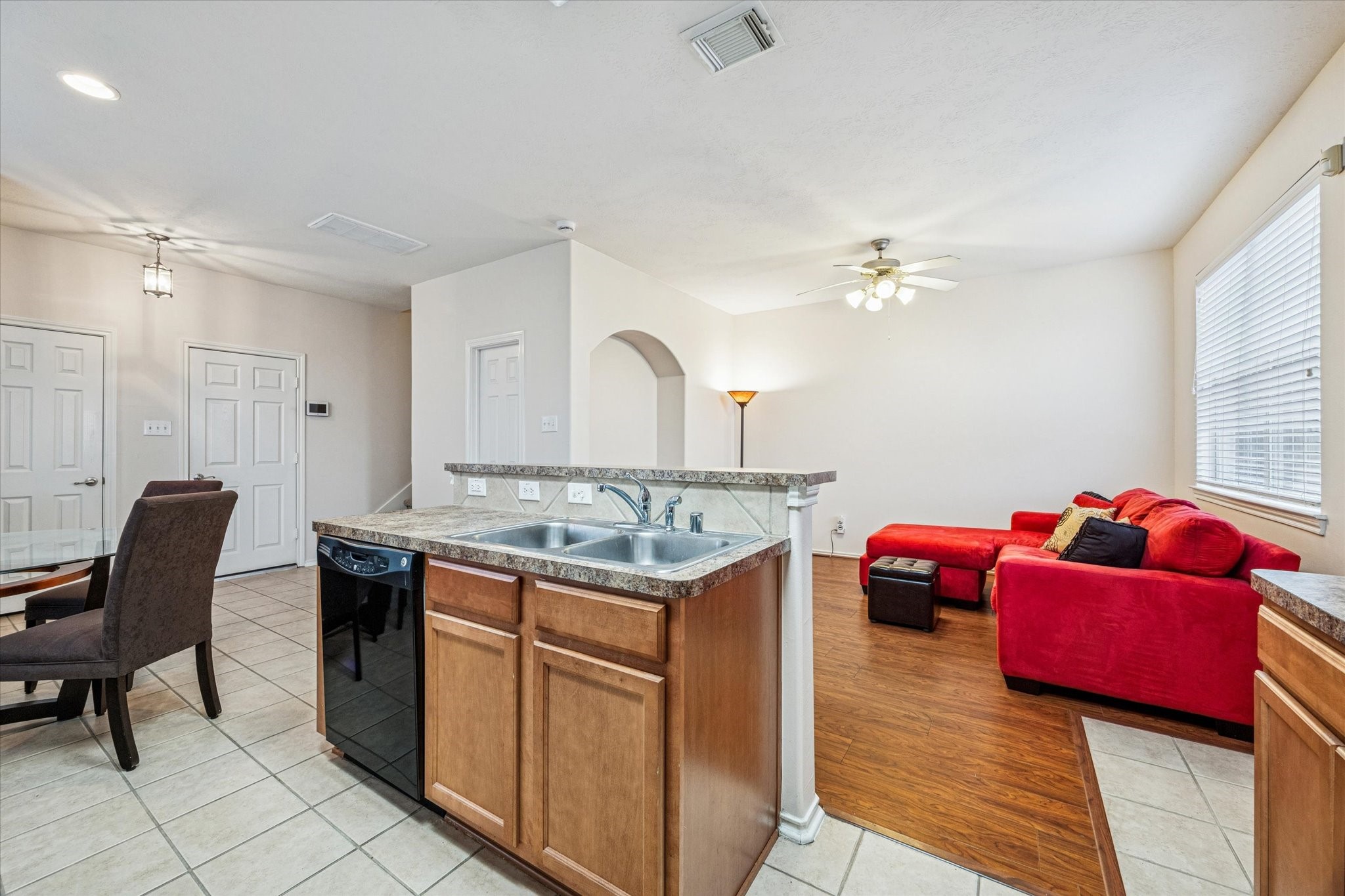 3206 Pearl Bluff Lane Houston, TX 77047 - Photo 7 of 20 a view of kitchen with stainless steel appliances granite countertop stove top oven and cabinets