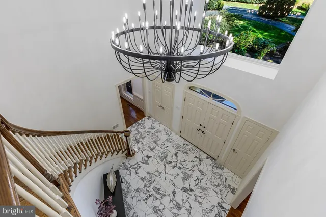 a view of a balcony with furniture