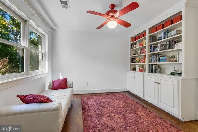 a workspace with furniture and window