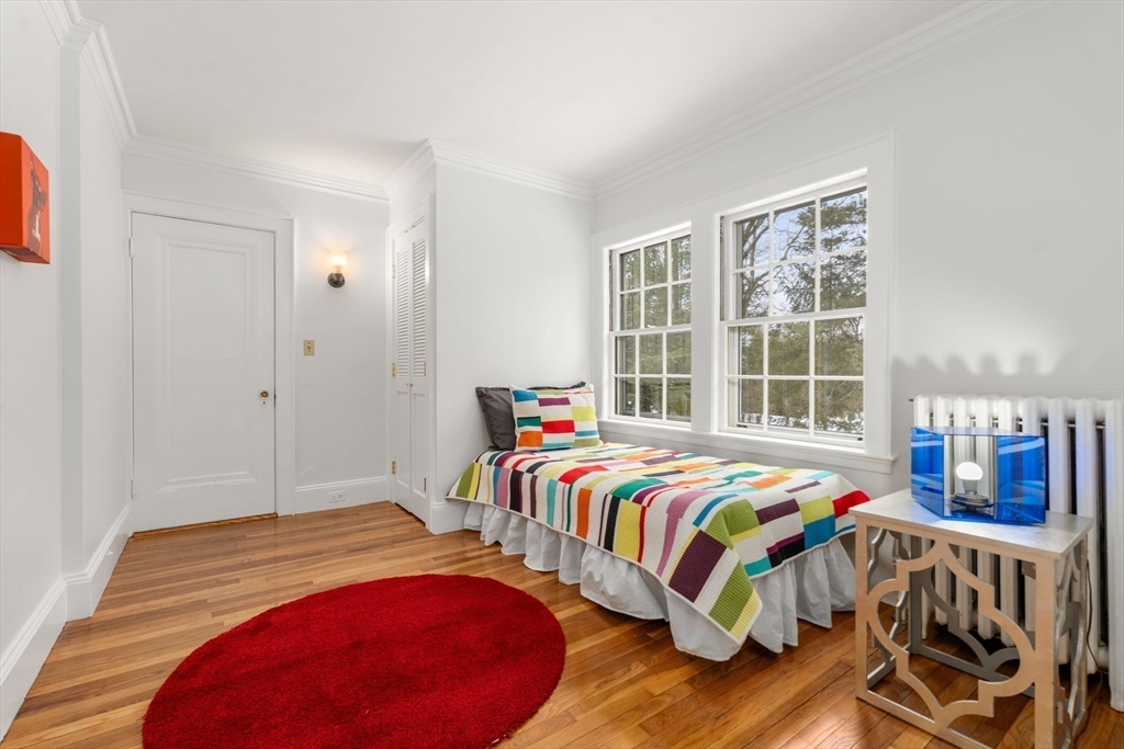 15 Gammons Road Newton, MA 02468 - Photo 15 of 20 a bedroom with a bed and a window