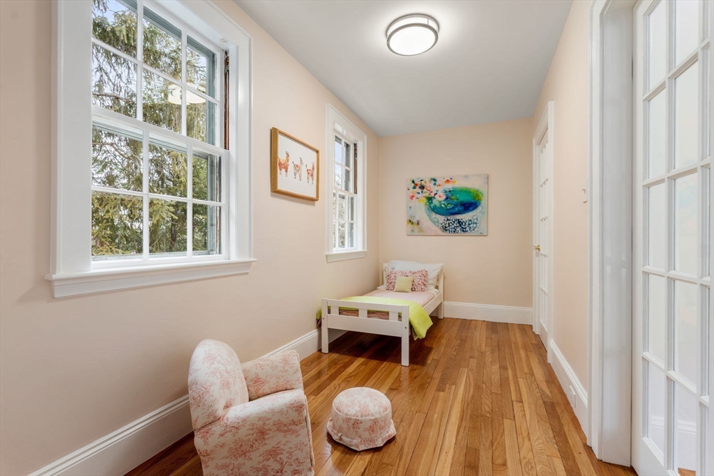 15 Gammons Road Newton, MA 02468 - Photo 16 of 20 a living room with furniture and a window