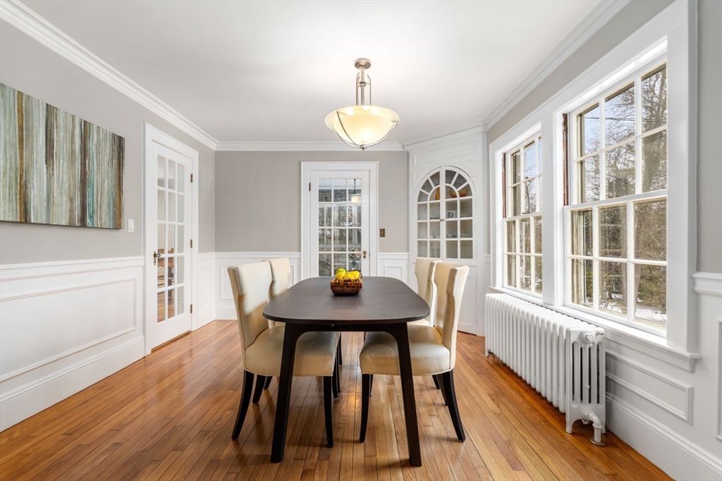 15 Gammons Road Newton, MA 02468 - Photo 5 of 20 a view of a dining room with furniture window and wooden floor