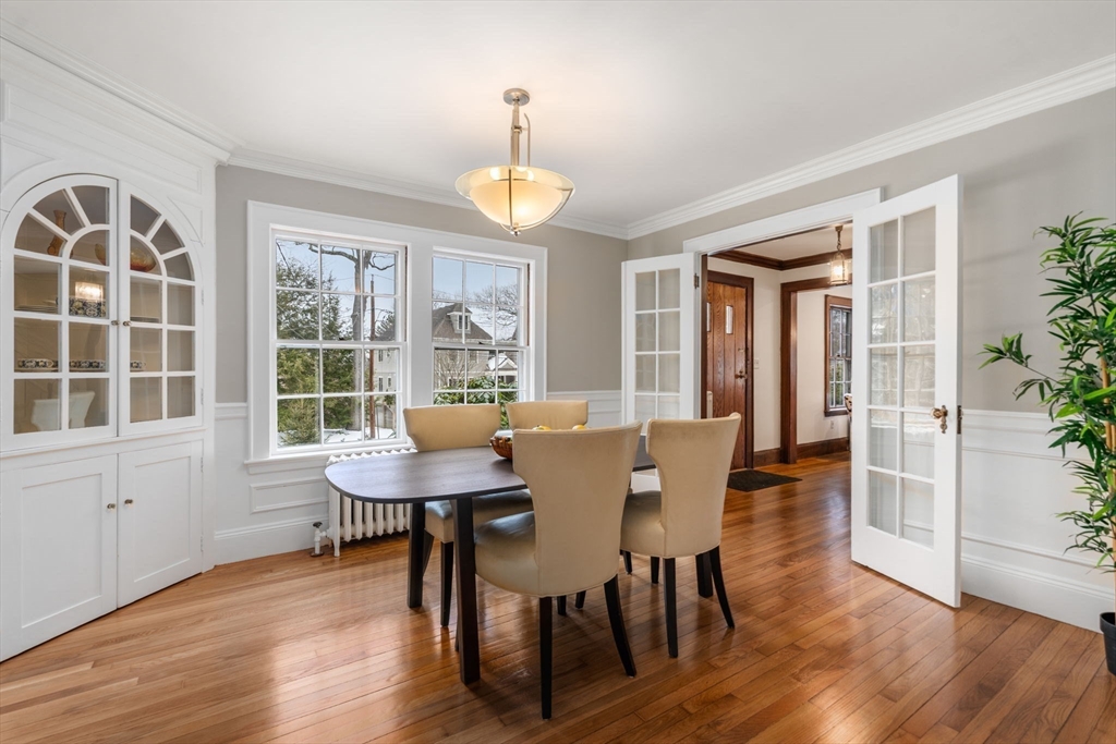 15 Gammons Road Newton, MA 02468 - Photo 6 of 20 a view of a dining room with furniture window and wooden floor