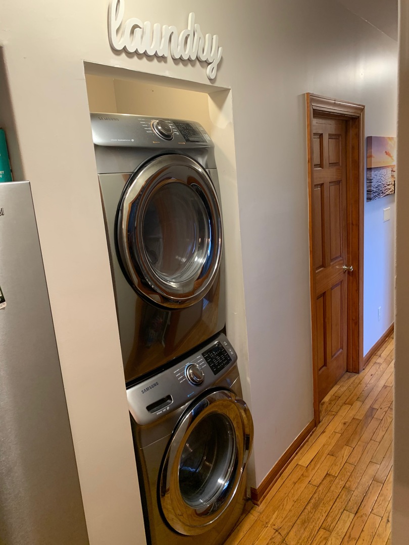 549 East 60th Street, Unit 1 Chicago, IL 60637 - Photo 4 of 11 a utility room with dryer and washer