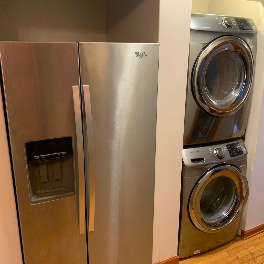 549 East 60th Street, Unit 1 Chicago, IL 60637 - Photo 5 of 11 a close up view of a washer and dryer