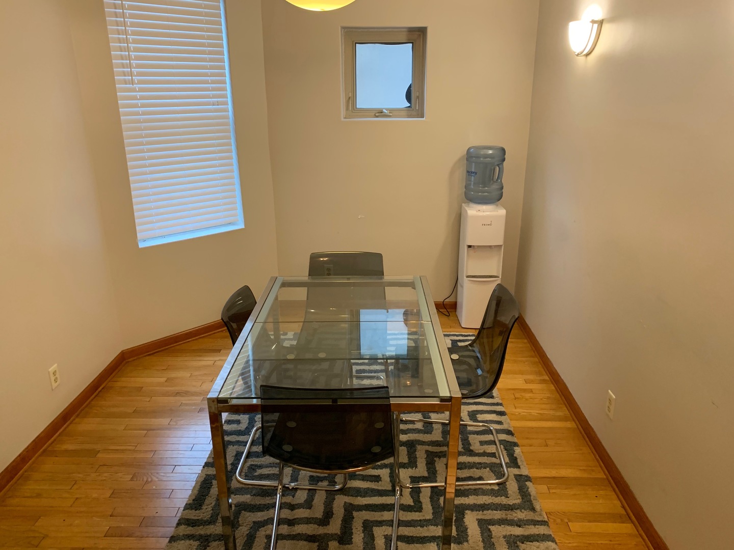 549 East 60th Street, Unit 1 Chicago, IL 60637 - Photo 7 of 11 a view of a balcony with chair and wooden floor
