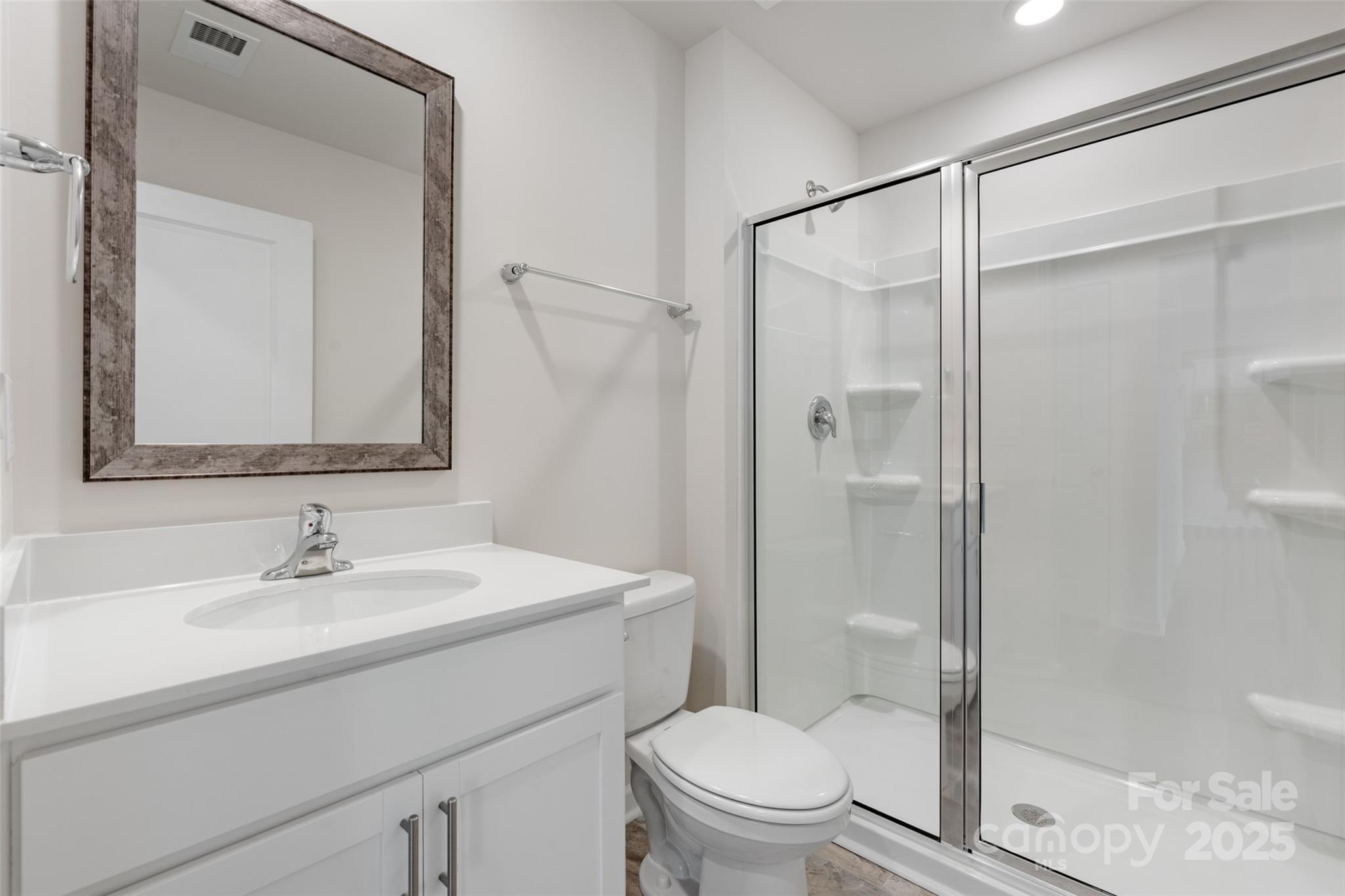 172 Callie River Clyde, NC 28721 - Photo 12 of 21 a bathroom with a sink toilet and shower