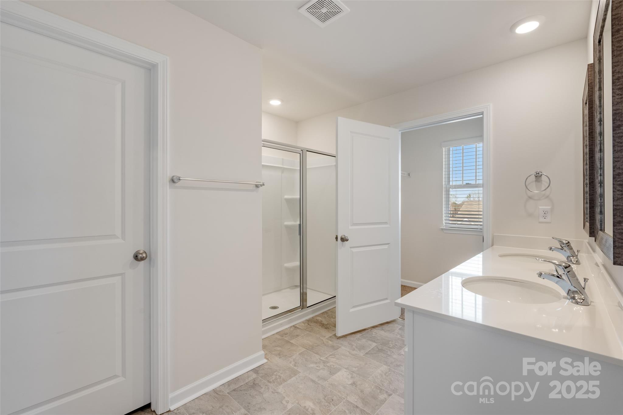 172 Callie River Clyde, NC 28721 - Photo 15 of 21 a bathroom with a tub sink and mirror