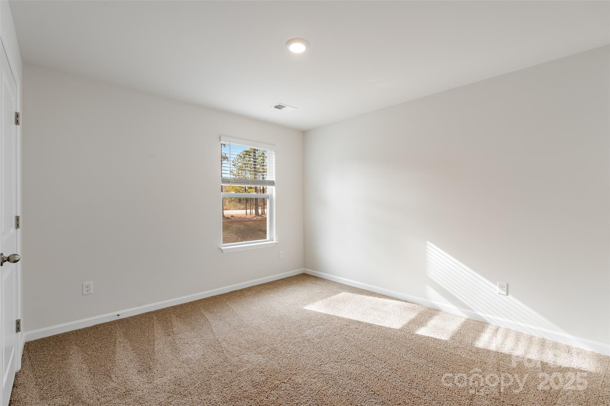172 Callie River Clyde, NC 28721 - Photo 19 of 21 an empty room with a window